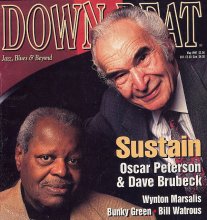 On the cover of Downbeat with Oscar Peterson, November 1997.